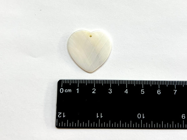 Corazón, Caracol, Charm